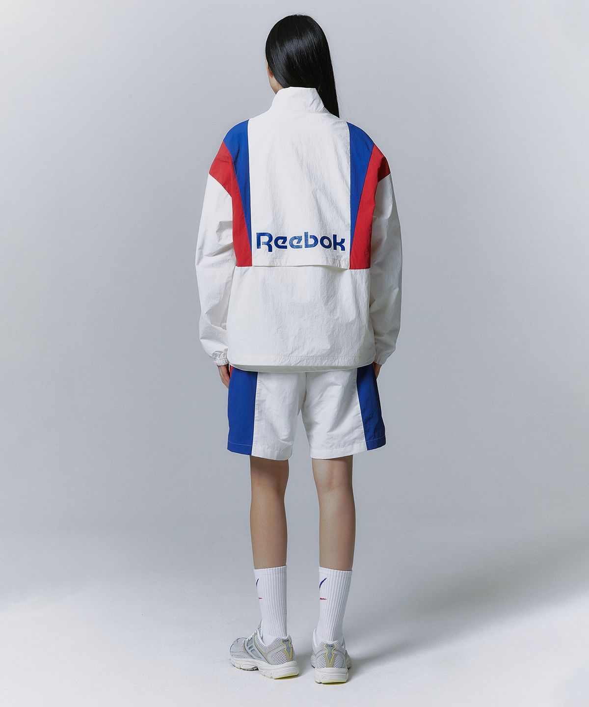 리복(REEBOK) 트윈 벡터 윈드 브레이커 - 오프 화이트