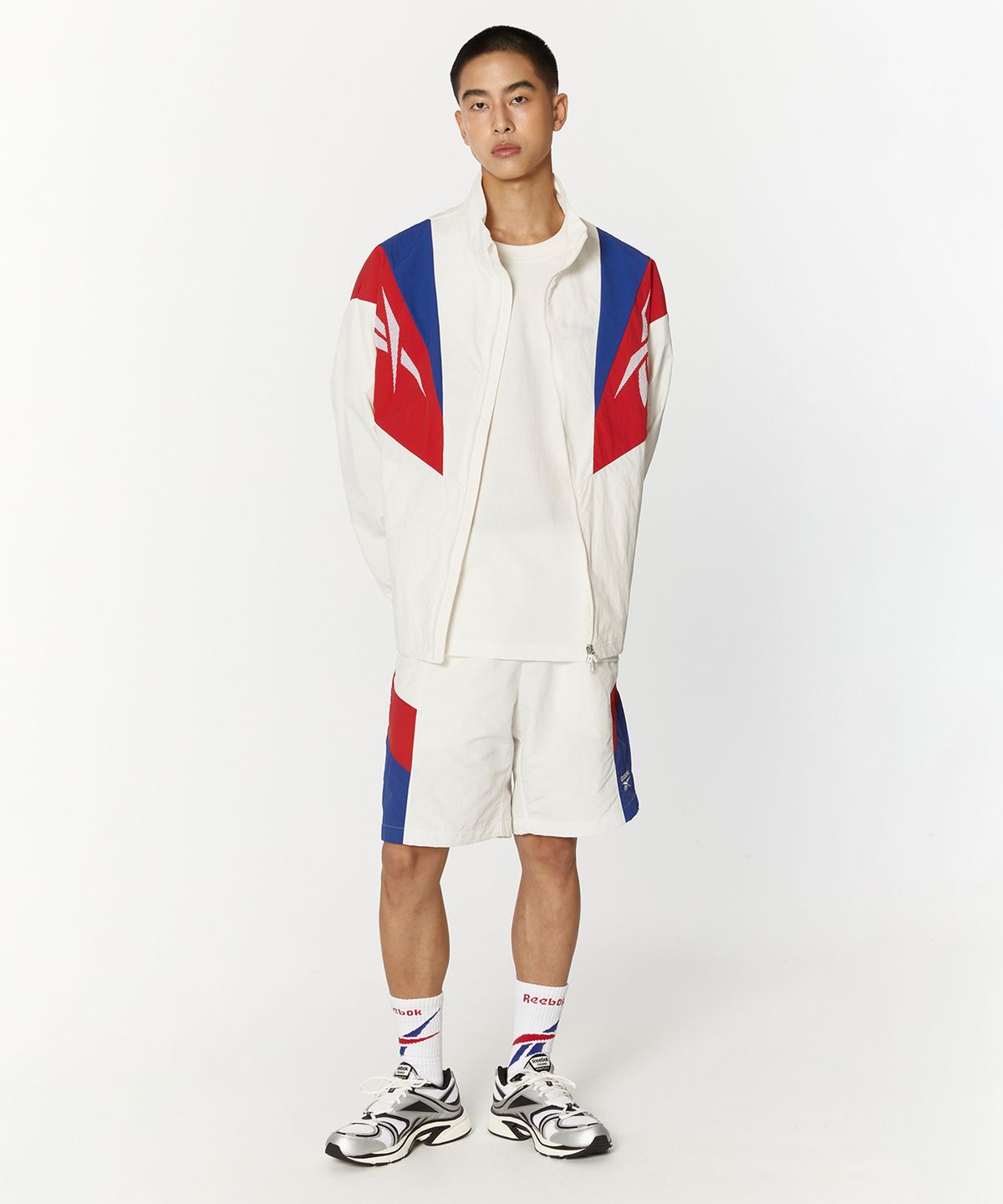 리복(REEBOK) 트윈 벡터 윈드 브레이커 - 오프 화이트