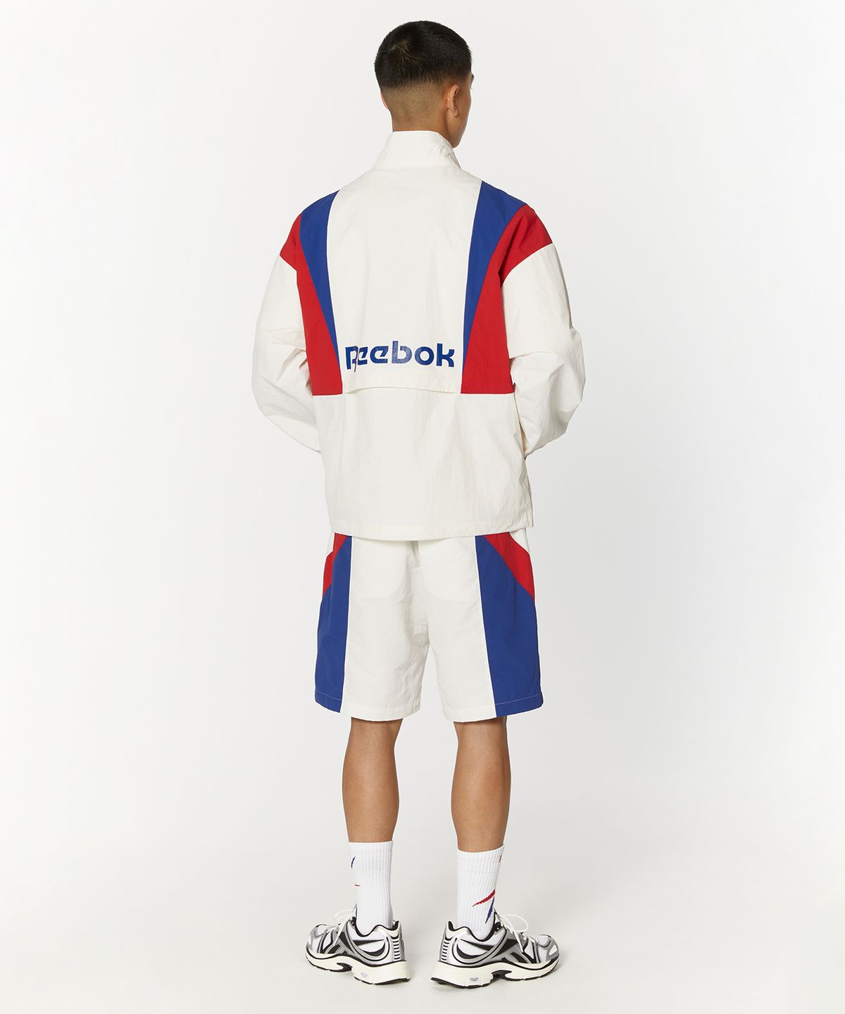리복(REEBOK) 트윈 벡터 윈드 브레이커 - 오프 화이트