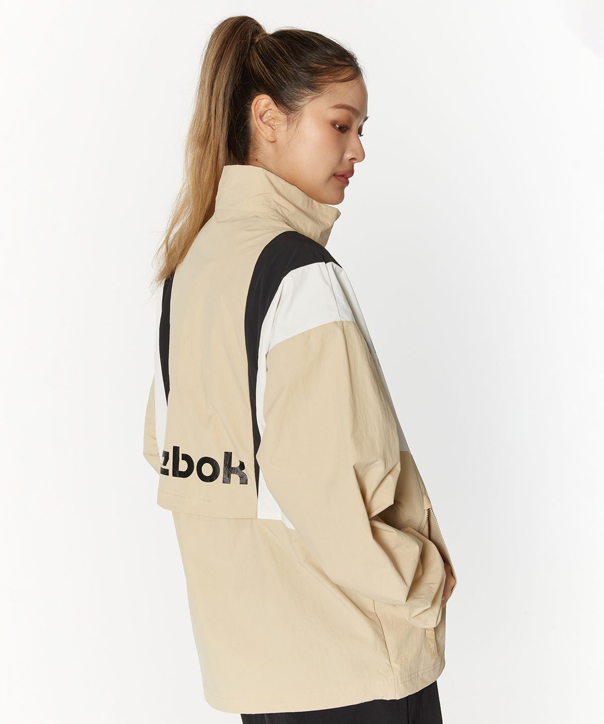 리복(REEBOK) 트윈 벡터 윈드 브레이커 - 베이지