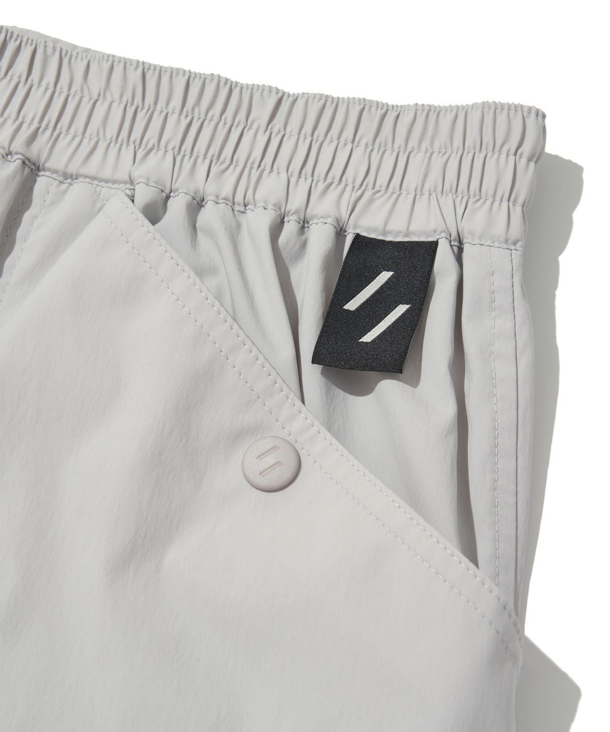 웰터 익스페리먼트(WELTER EXPERIMENT) ATTABAD HIKE SHORTS_LIGHT GRAY_WSP011