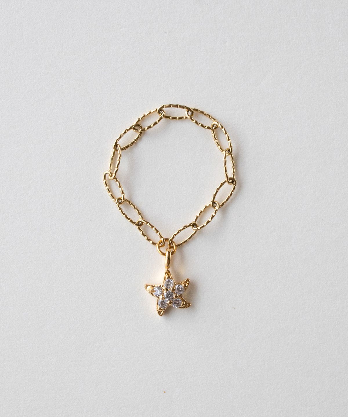 메리모티브(MERRYMOTIVE) Twinkle star with surgical chain ring
