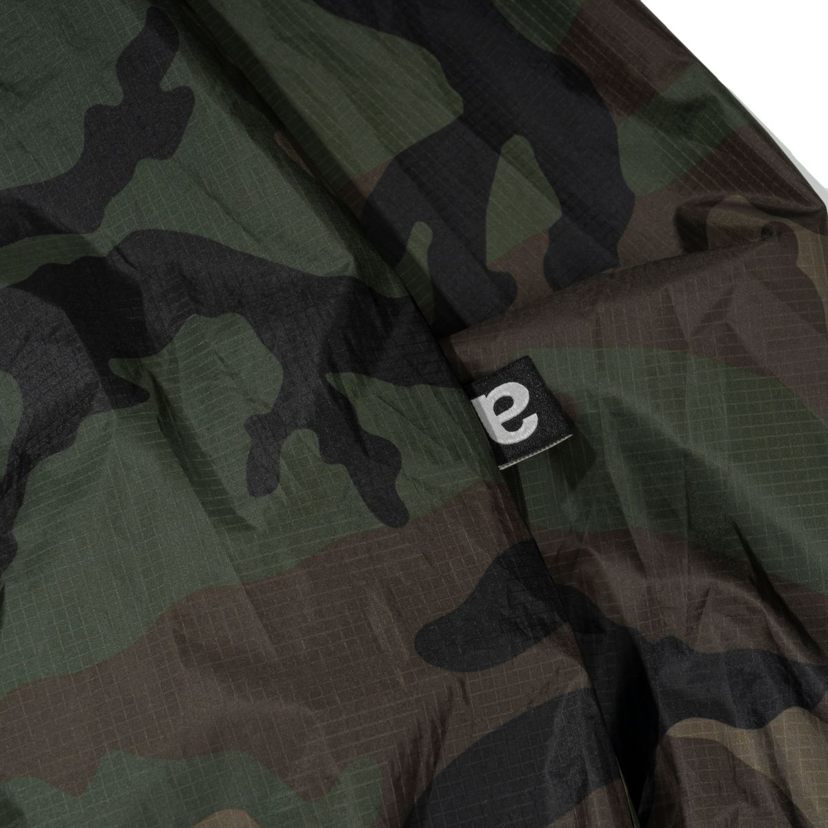 엑스트라오디너리(EXTRAORDINARY) CAMOUFLAGE ANORAK  WOODLAND CAMO