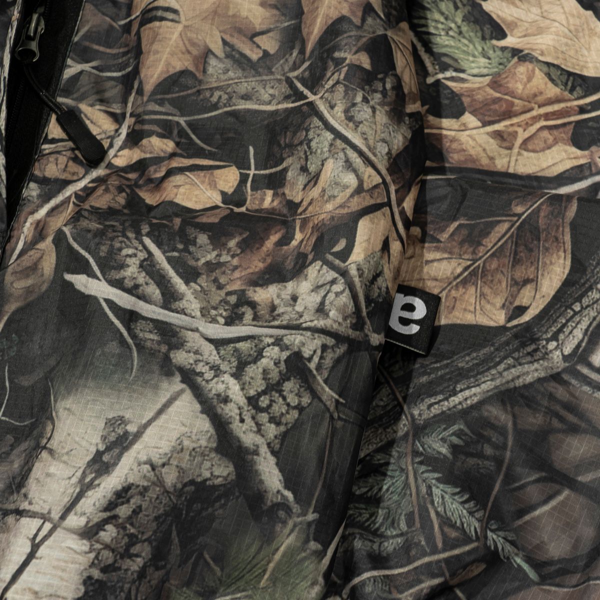 엑스트라오디너리(EXTRAORDINARY) CAMOUFLAGE ANORAK  REAL TREE CAMO