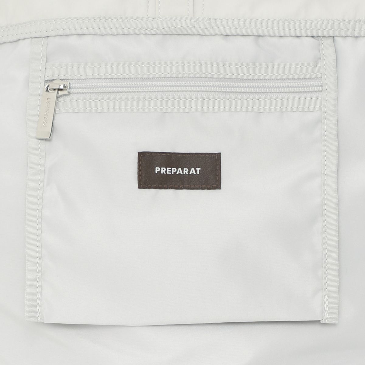 프레파라트(PREPARAT) 스트링 백팩 아이보리
