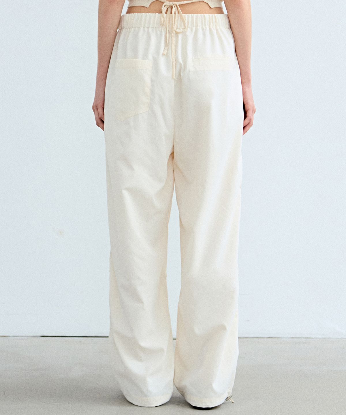 닉앤니콜(NICK&NICOLE) MINIMAL PARACHUTE PANTS_CREAM