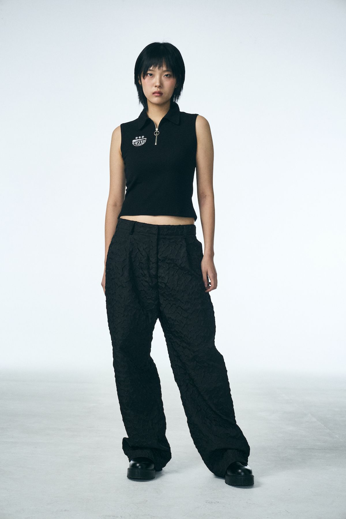 페노메논시퍼(PHENOMENON SEEPER) 333 HALF ZIP SLEEVELESS_BLACK