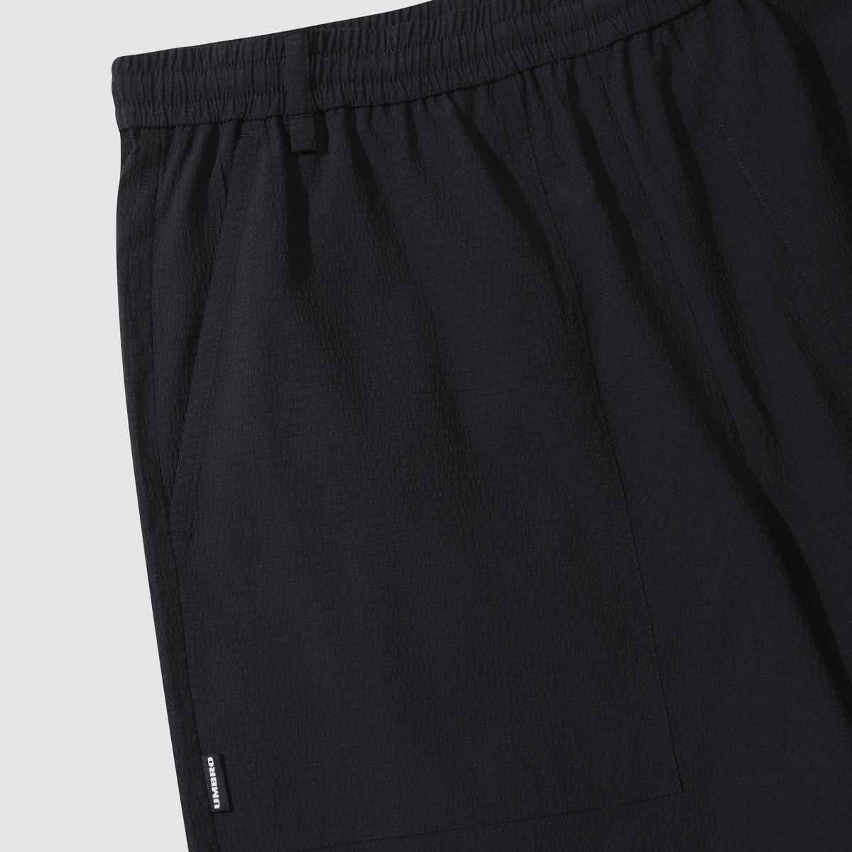 엄브로(UMBRO) 시어서커 4.5부 반바지 블랙(UQ223CHP63)