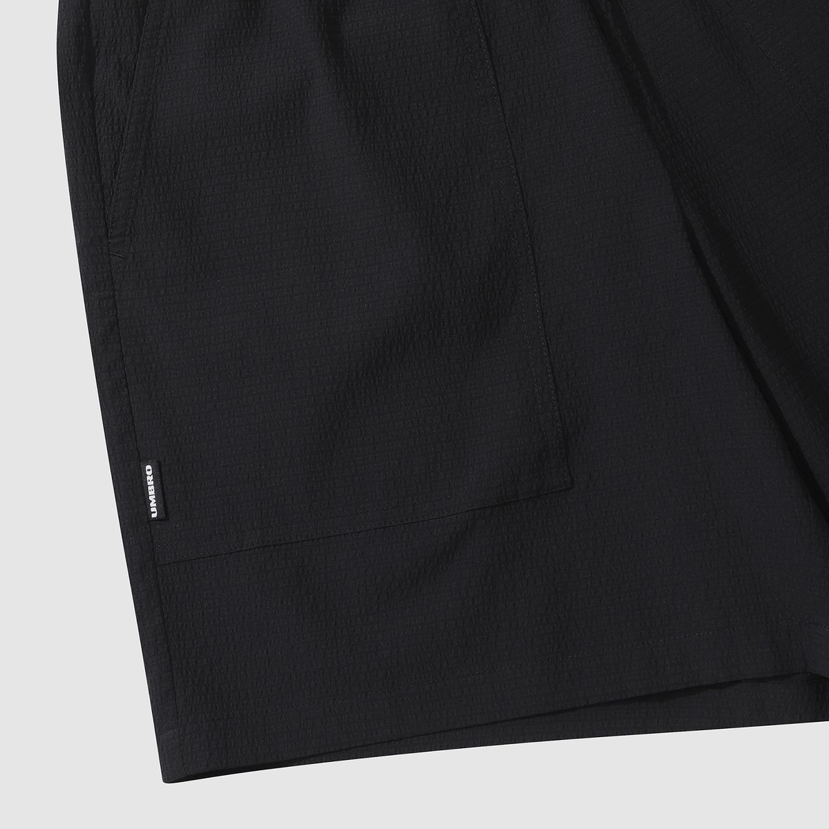 엄브로(UMBRO) 시어서커 4.5부 반바지 블랙(UQ223CHP63)