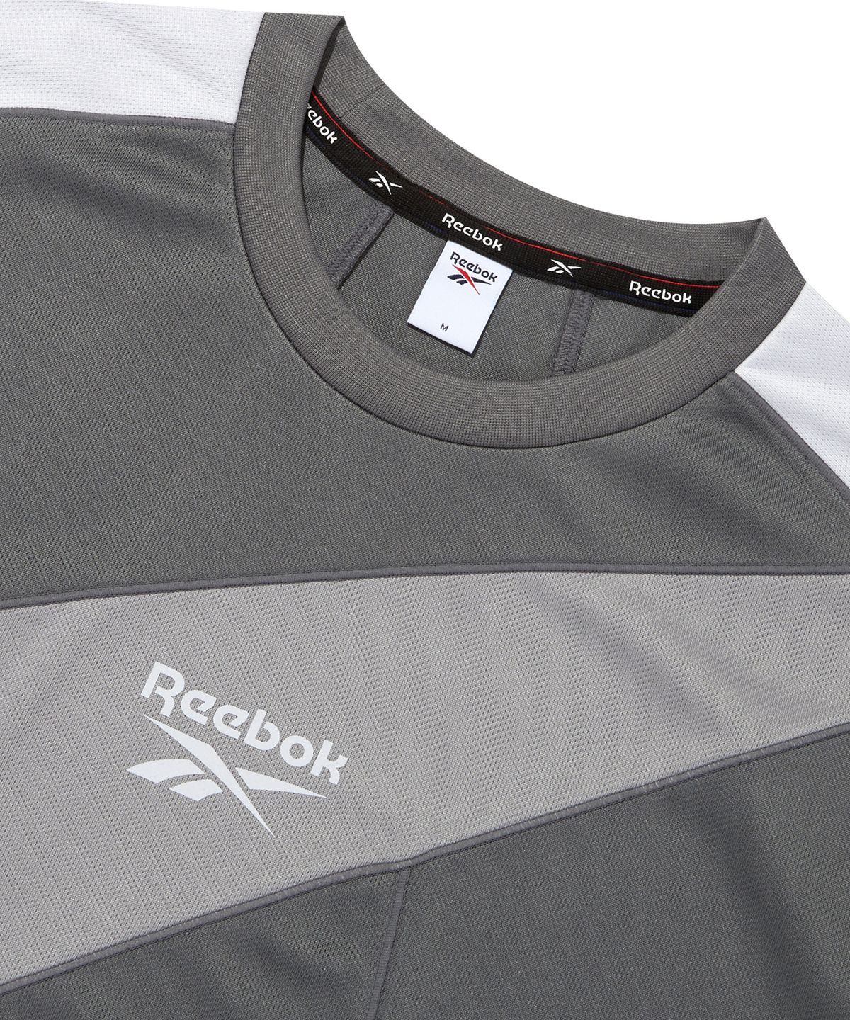 리복(REEBOK) 패널드 벡터 메쉬 티셔츠 - 그레이