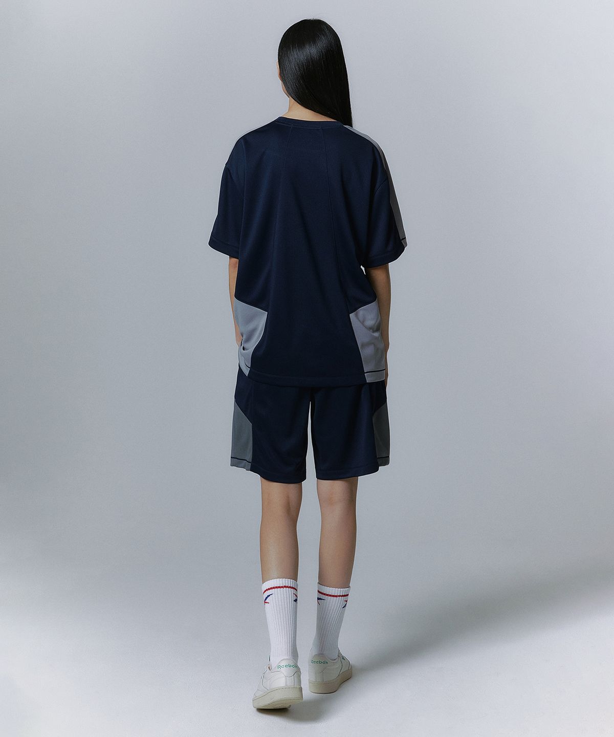 리복(REEBOK) 패널드 벡터 메쉬 티셔츠 - 네이비
