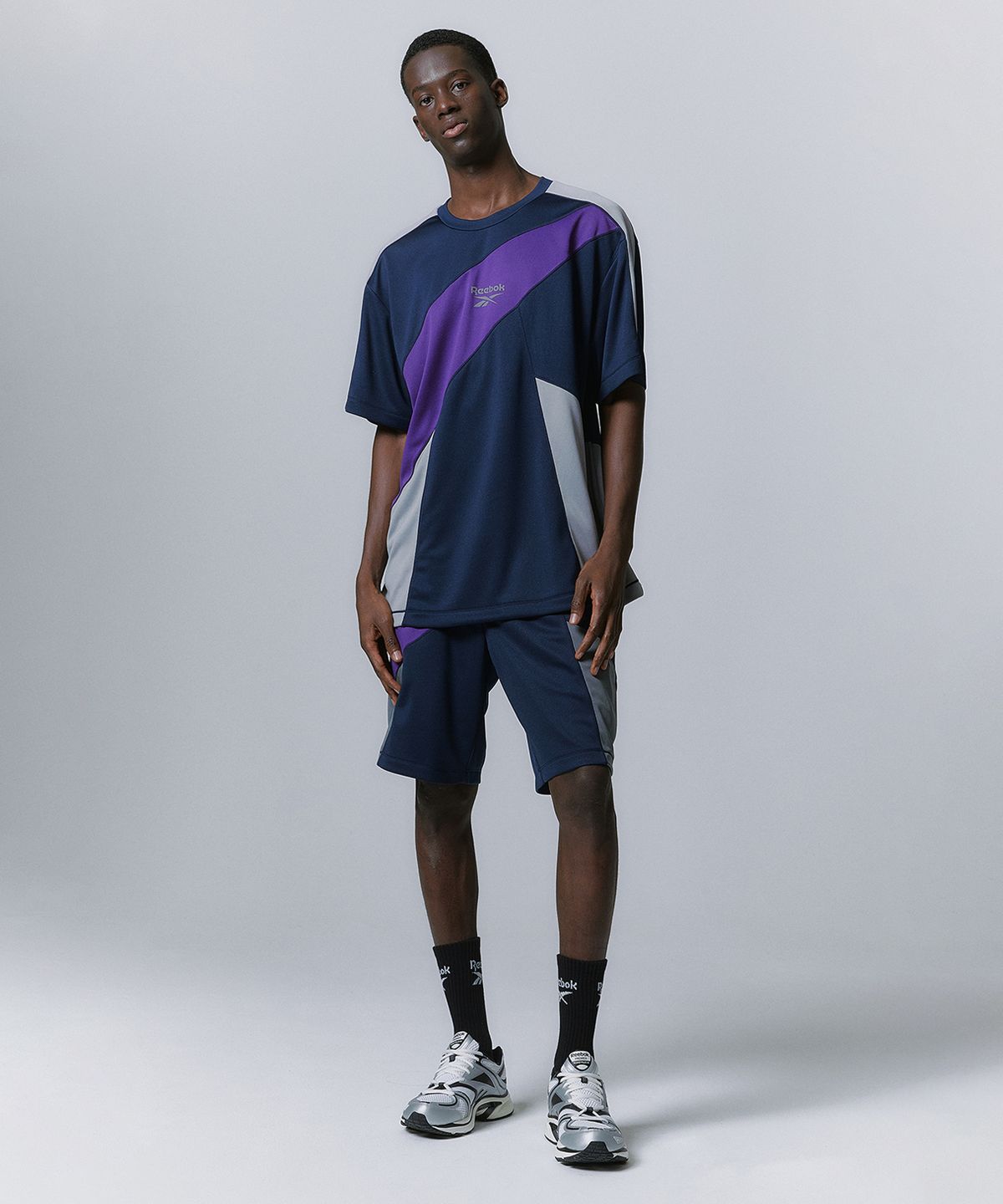 리복(REEBOK) 패널드 벡터 메쉬 쇼츠 - 네이비