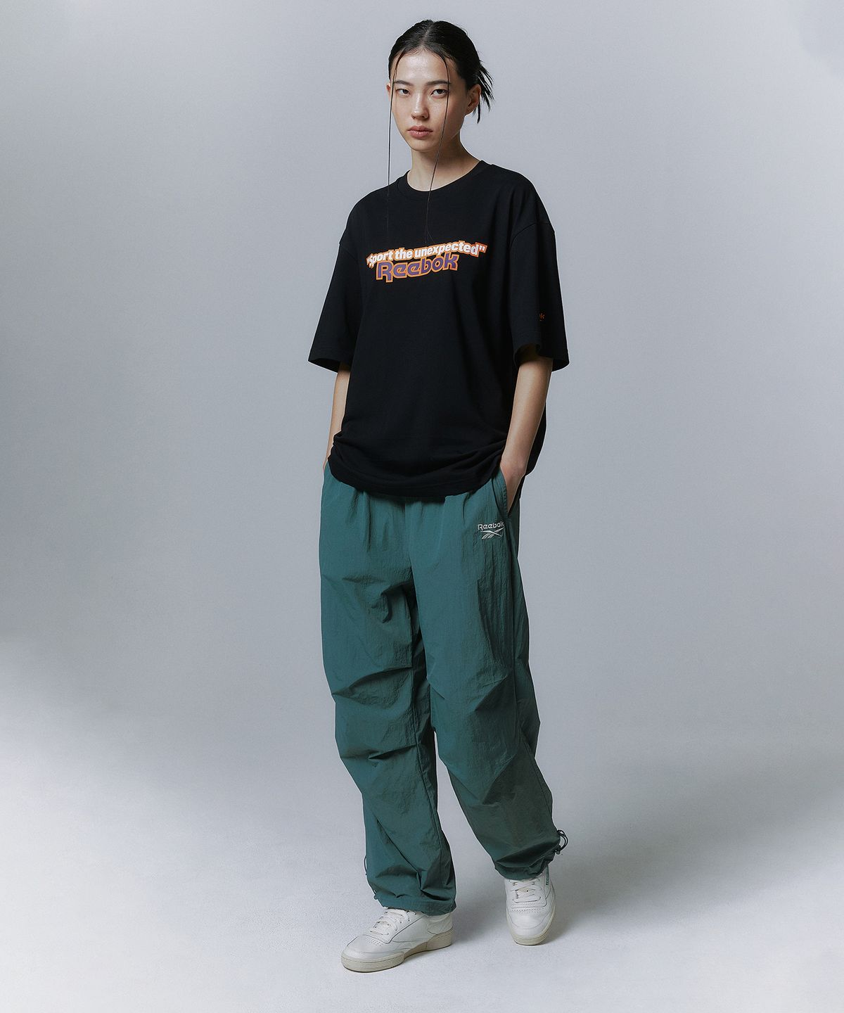 리복(REEBOK) TEAM SPORTS 그래픽 티셔츠 - 블랙