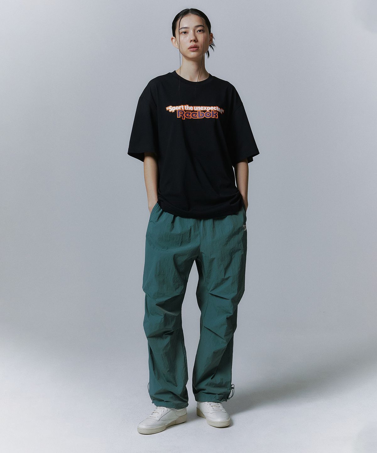 리복(REEBOK) TEAM SPORTS 그래픽 티셔츠 - 블랙
