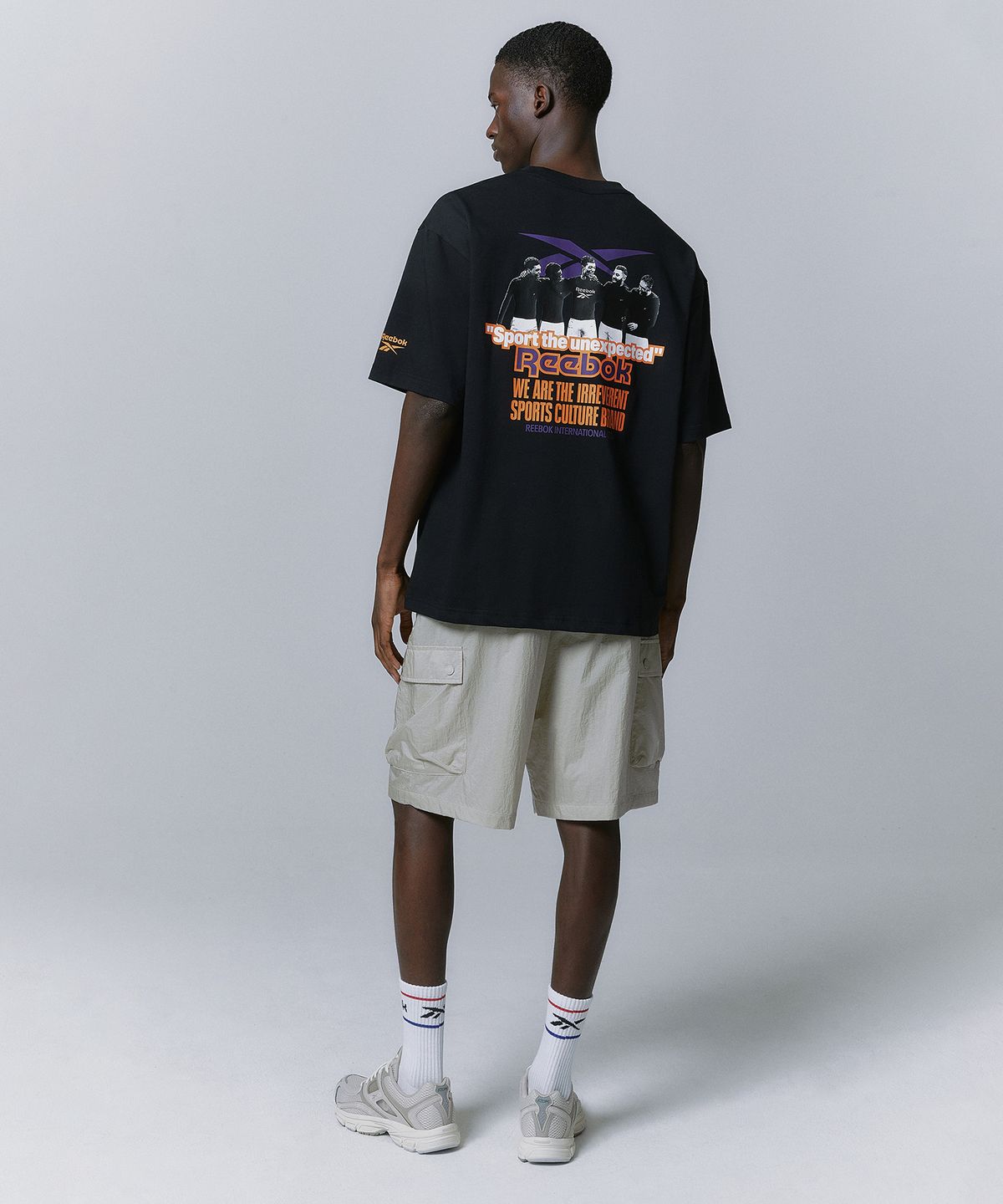 리복(REEBOK) TEAM SPORTS 그래픽 티셔츠 - 블랙