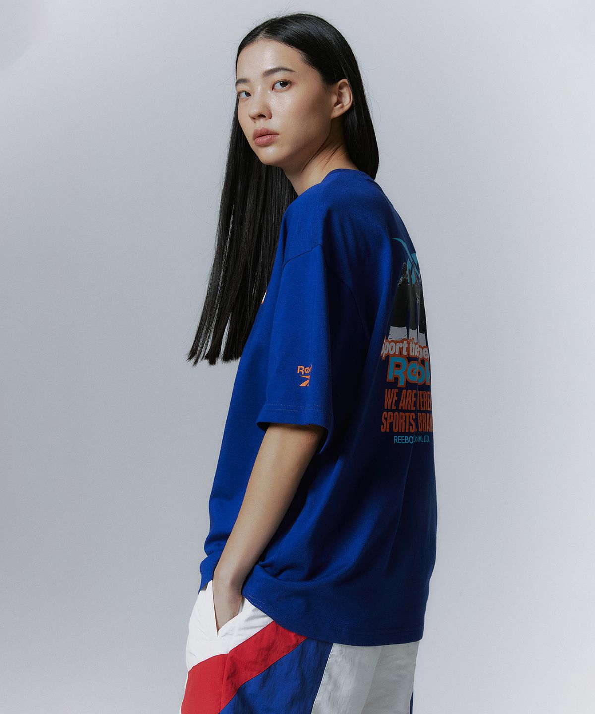 리복(REEBOK) TEAM SPORTS 그래픽 티셔츠 - 블루