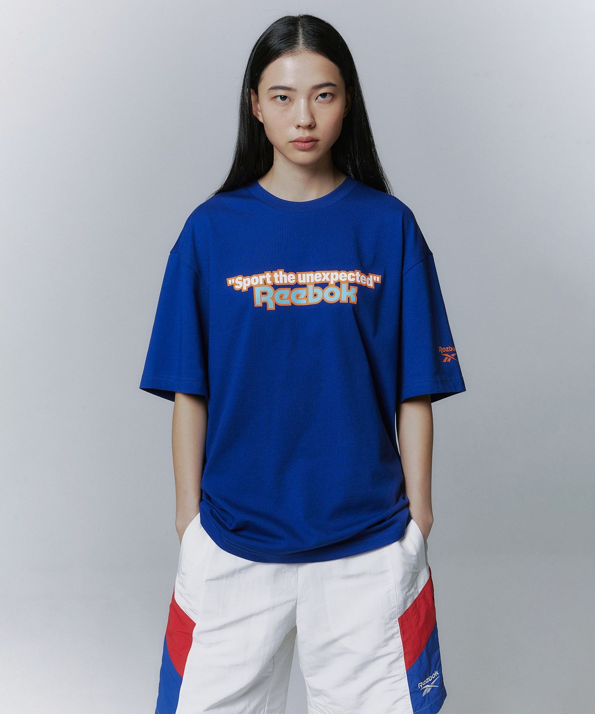 리복(REEBOK) TEAM SPORTS 그래픽 티셔츠 - 블루