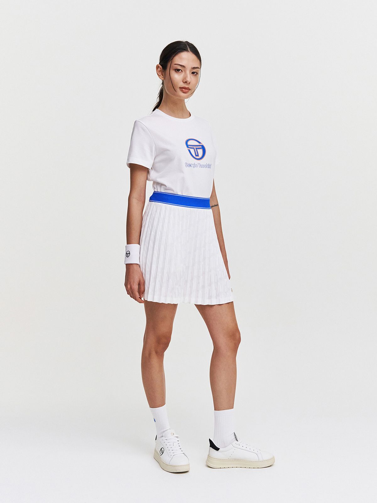 세르지오 타키니(SERGIO TACCHINI) W 리조트 AOP 플리츠 스커트 (White)