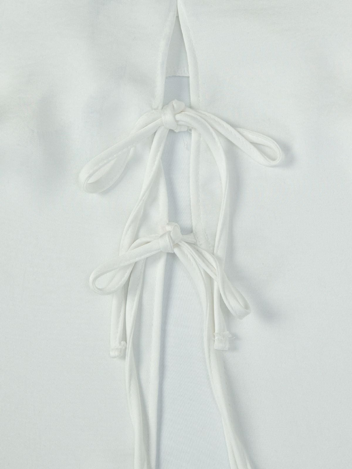 에즈이프 캘리(ASIF CALIE) RIBBON OPEN SLEEVELESS BLOUSE WHITE