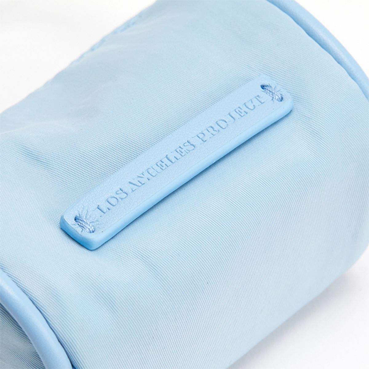 랩(LAP) CYLINDER POUCH BAG CHARM AQ7AB421