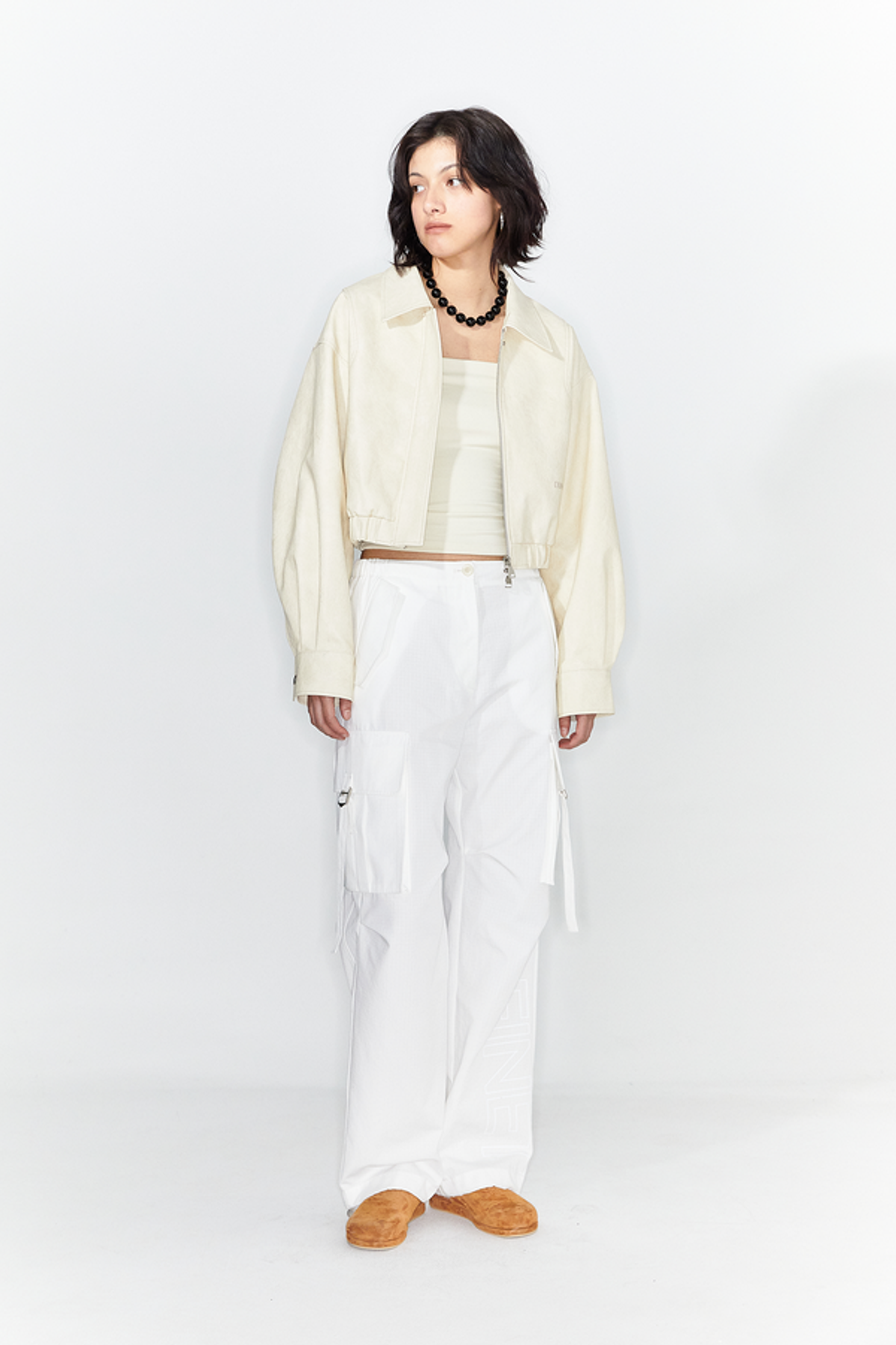 다이닛(DEINET) FAUX-LEATHER BOMBER BANDED JUMPER IN CREAM