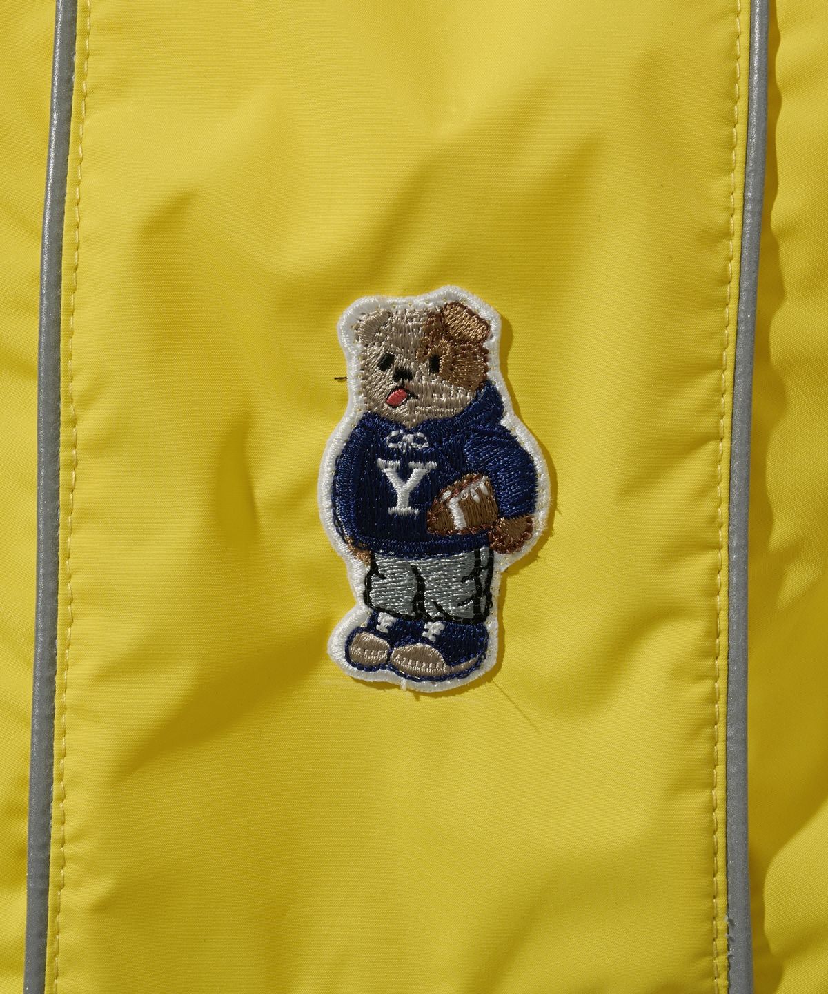 예일(YALE) 엠브로이더리 댄 도기 레인코트 옐로우