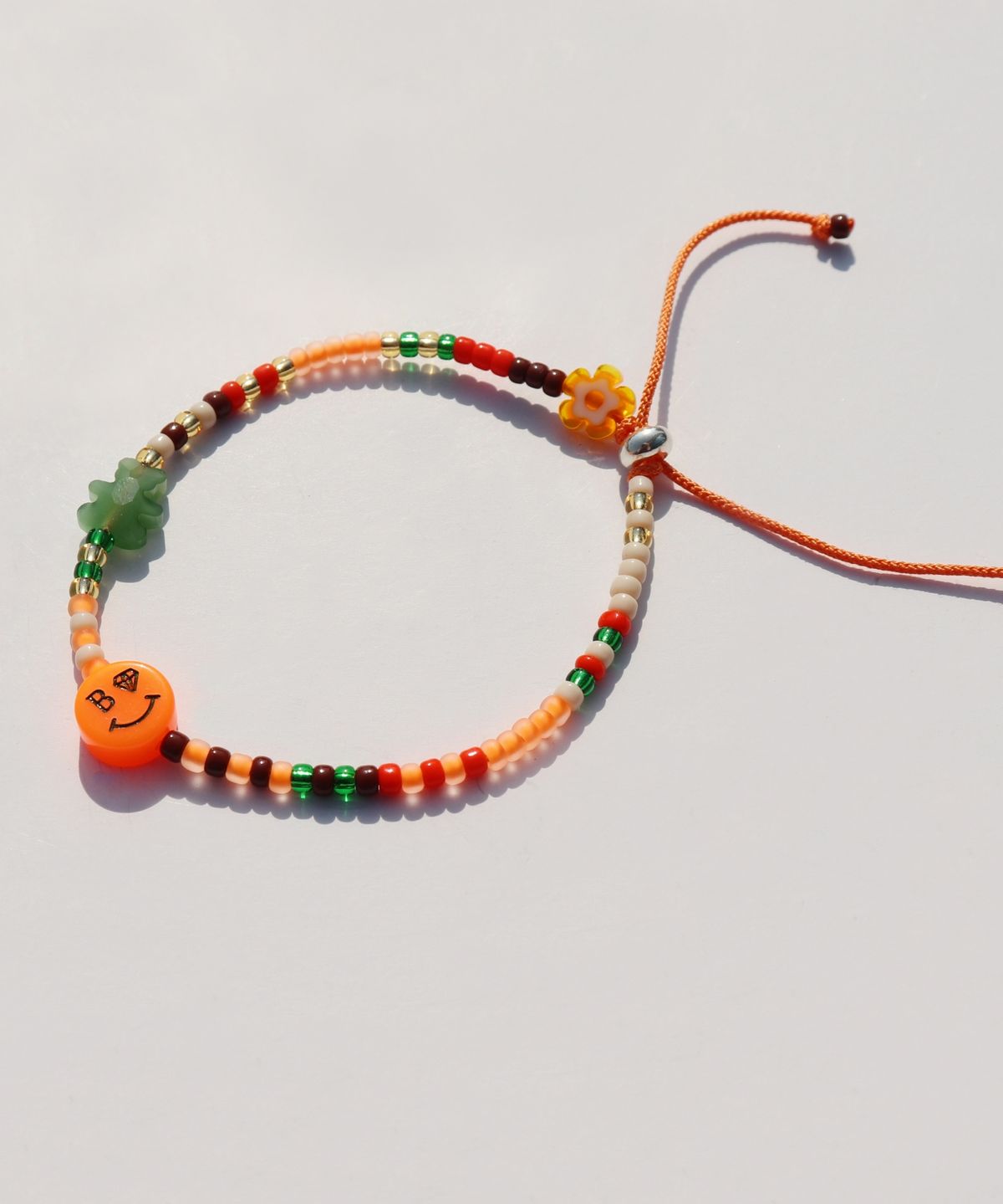 봉보(BONBEAU) Kitsch motives charm beads knot Bracelet 키치 스마일 곰돌이 참 비즈 실팔찌 매듭팔찌