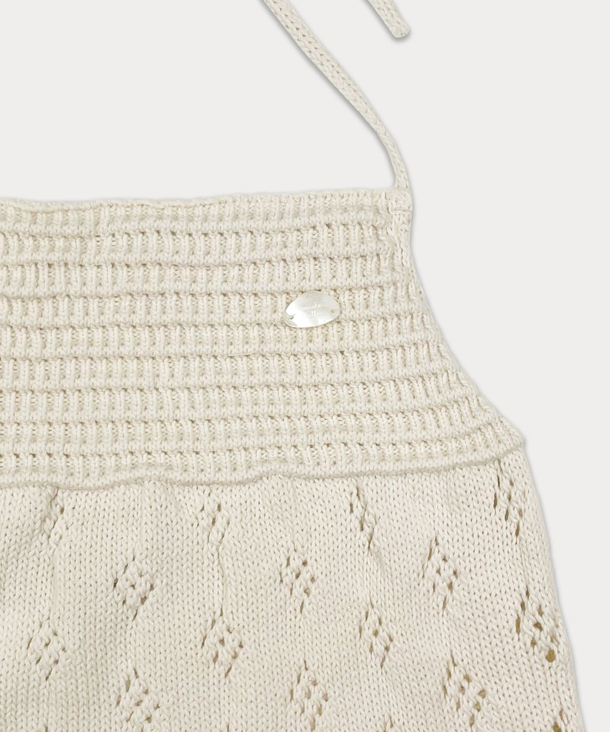 썸웨어버터(SOMEWHEREBUTTER) Skashi Halter Neck Knit Sleeveless - Cream