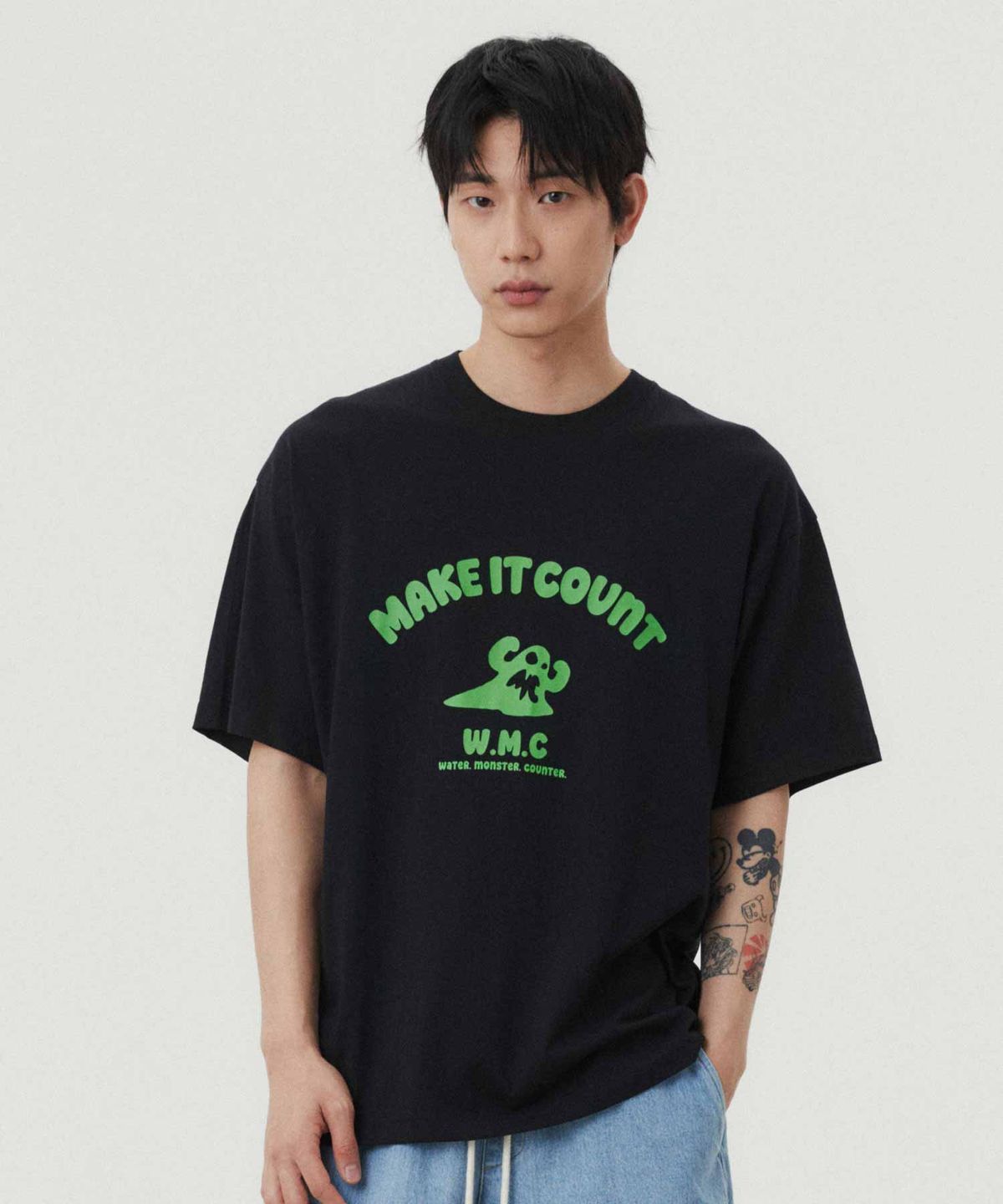 더블유엠씨(WMC) 아치 몬스터 티셔츠_BLACK