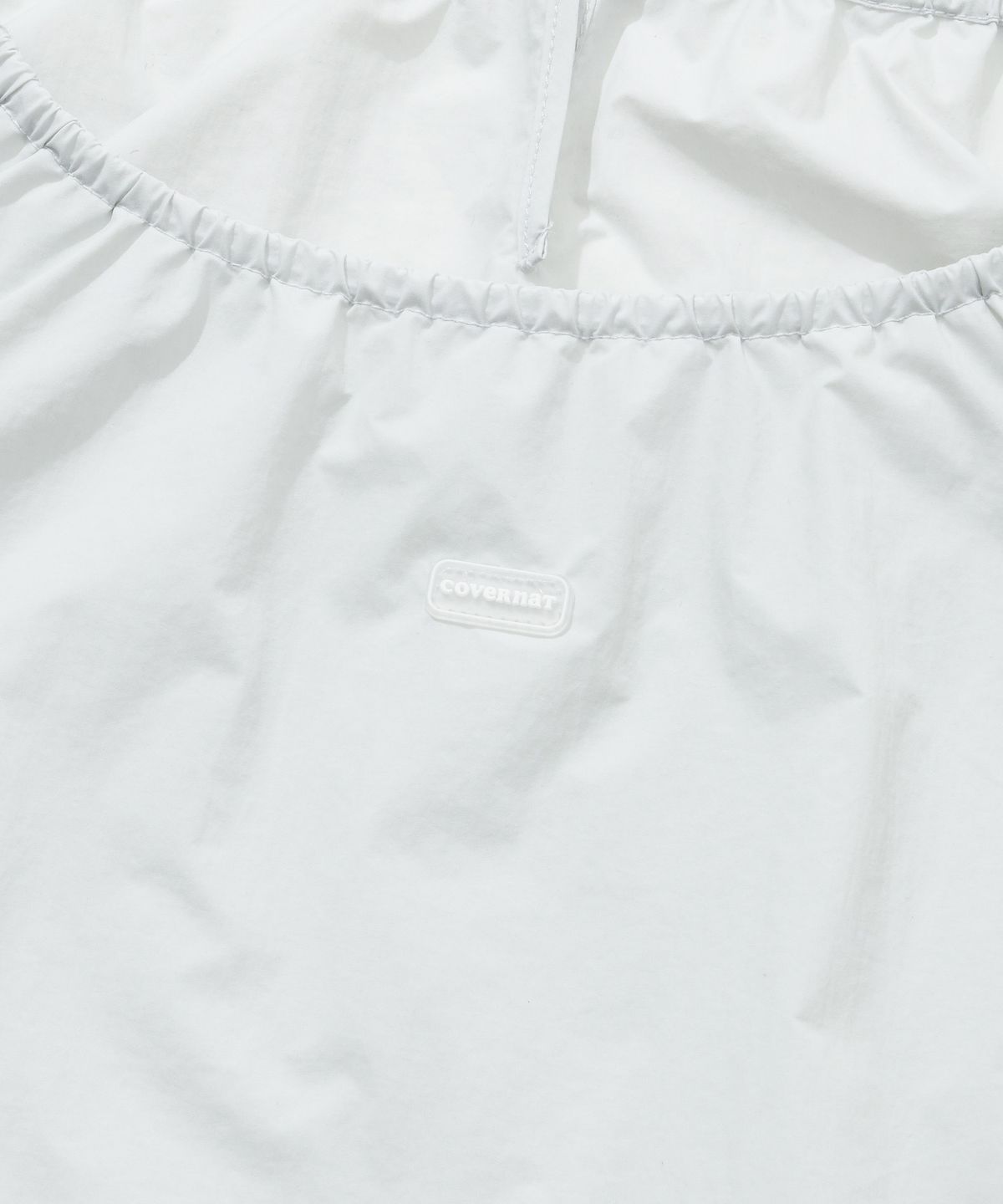커버낫 우먼(COVERNAT WOMAN) 우먼 나일론 벌룬 스트링 슬리브리스 Light Gray