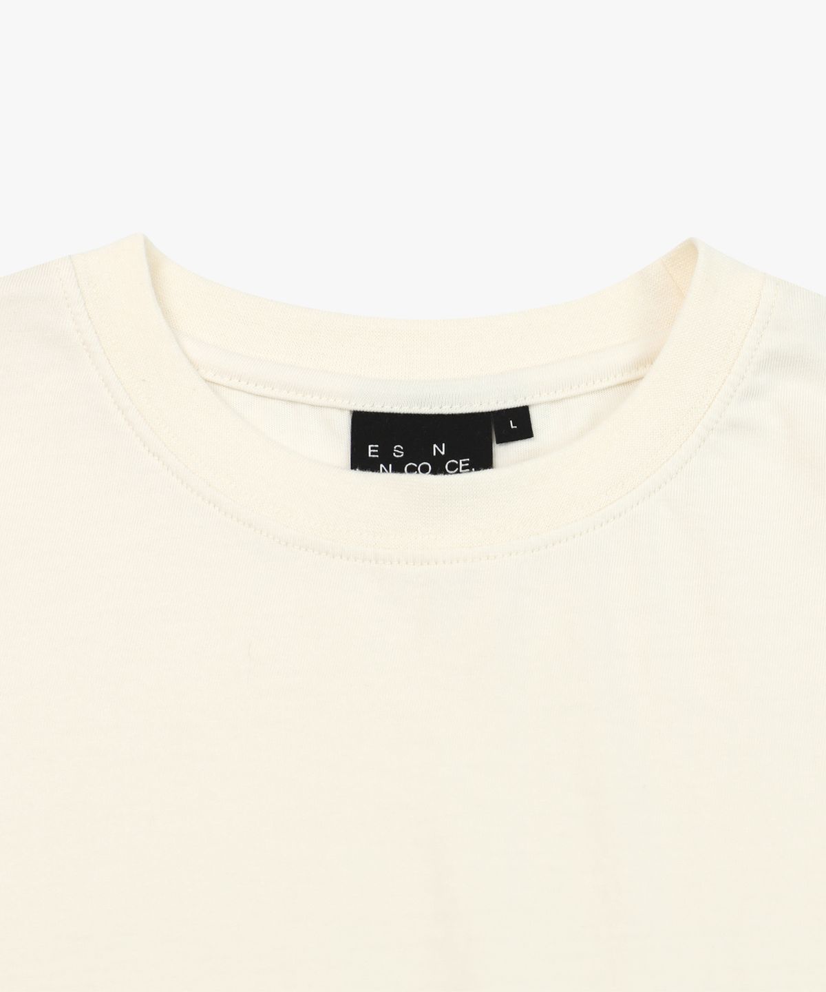 이에스엔(ESN) ensconce 포인트 와펜 오버핏 티셔츠  크림