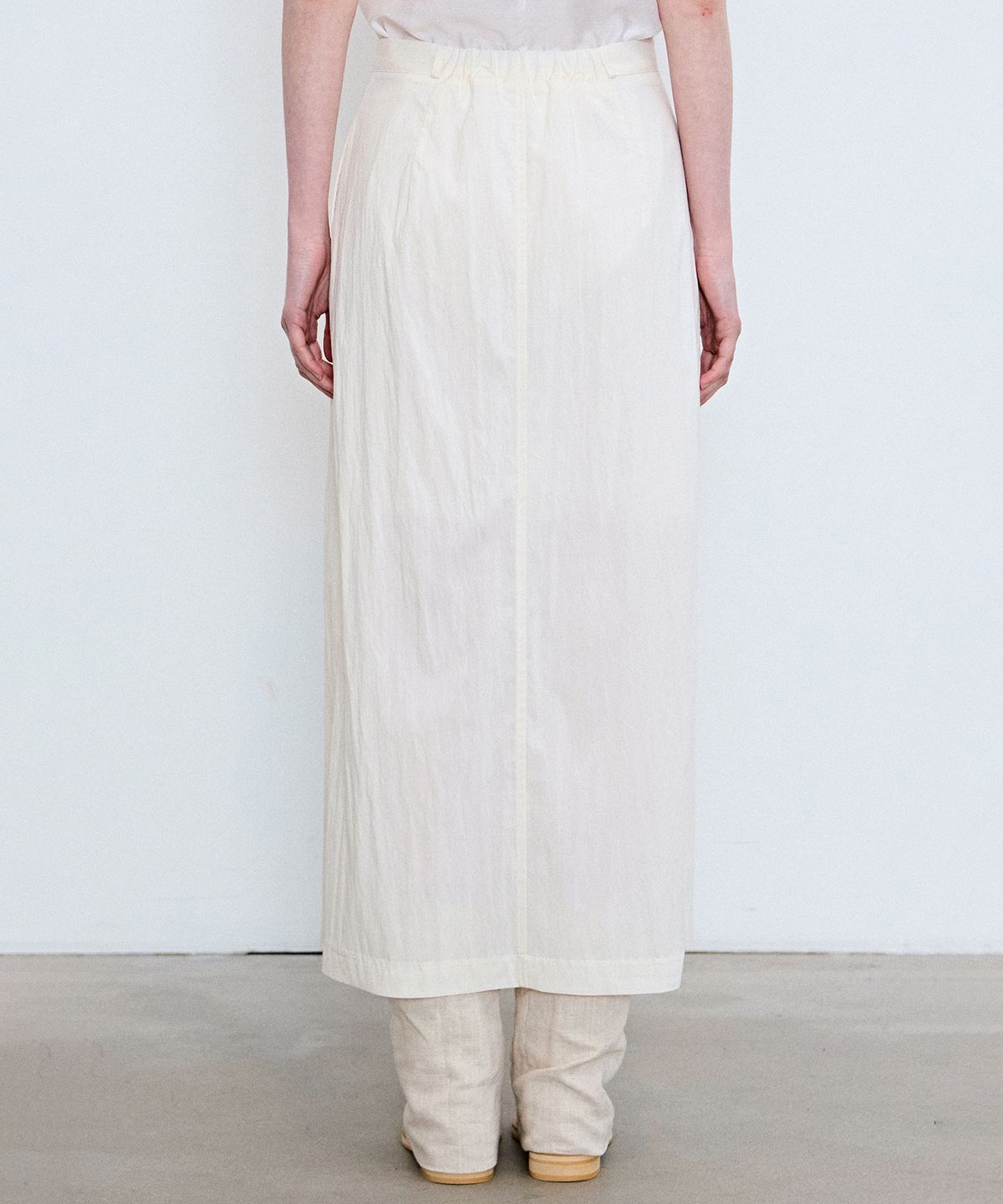 닉앤니콜(NICK&NICOLE) SEERSUCKER SLIT LONG SKIRT_IVORY