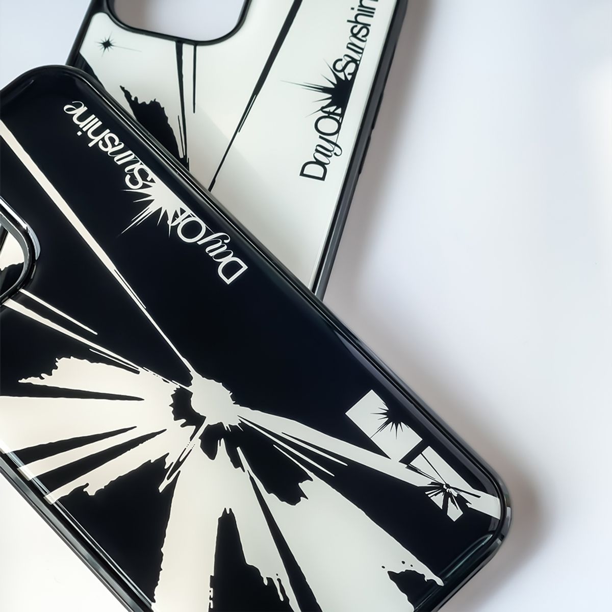 메모리즈바운더리(MEMORIESBOUNDARY) DOS Sunshine Graphic Phone Case (BK)