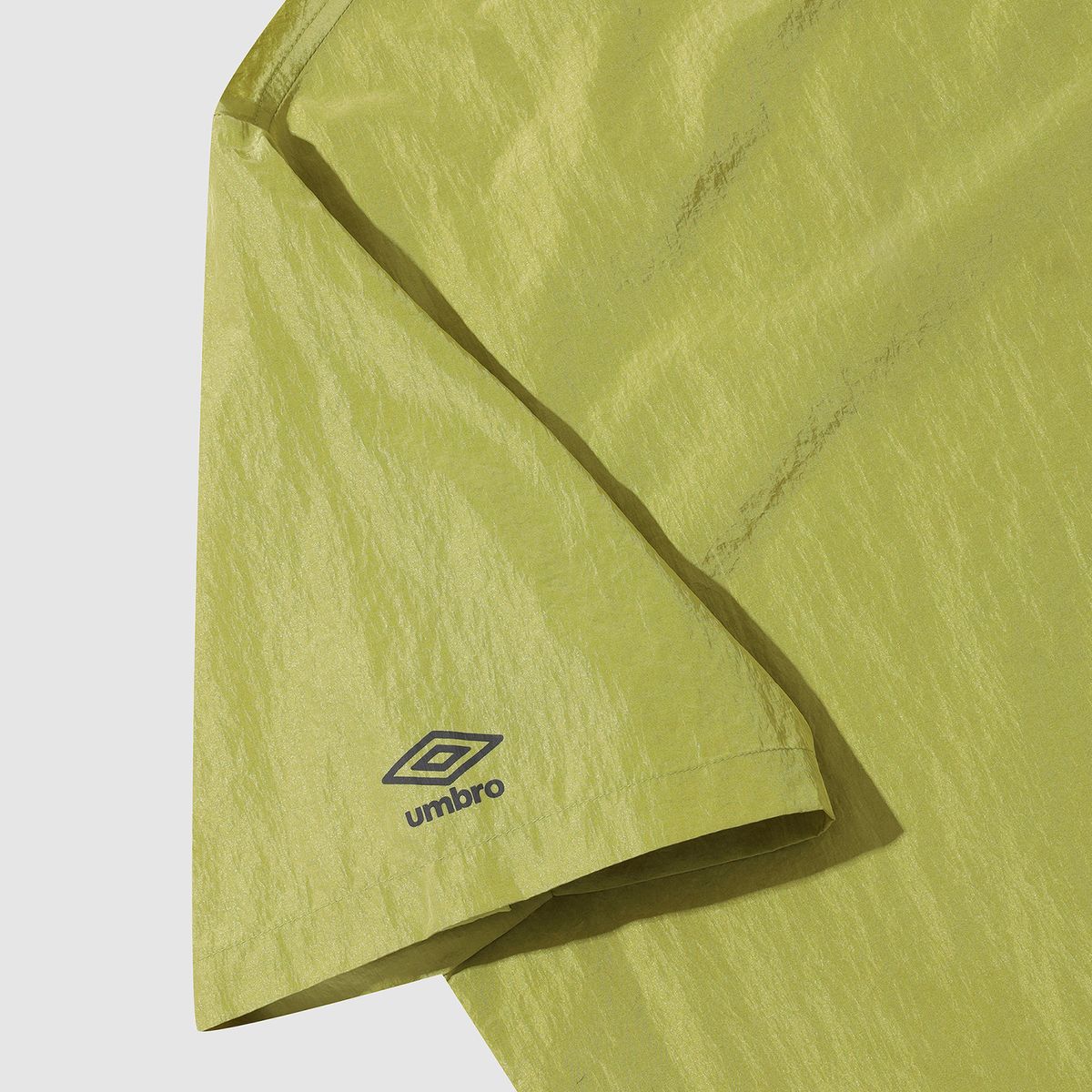 엄브로(UMBRO) RAVE 나일론메탈 반팔 피스테 그린(UP321CWT82)