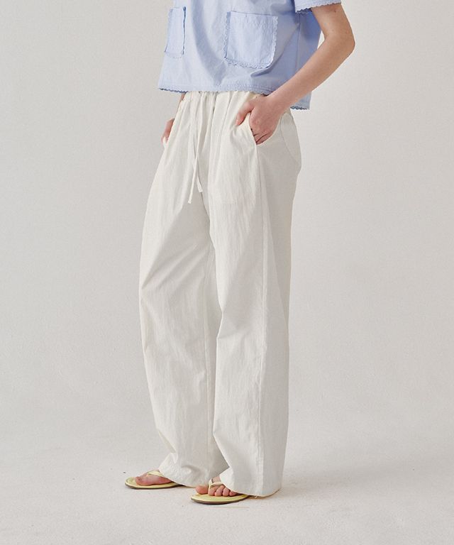 MUSINSA | RONRON BACK HEART STITCH POCKET BANDING PANTS WHITE