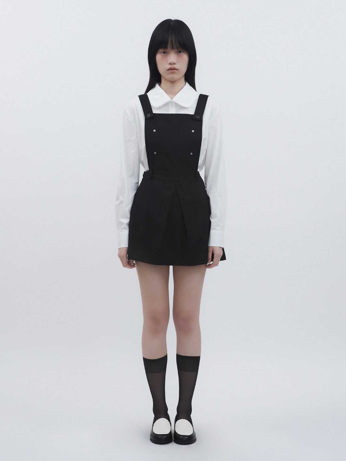 뚜오미오(TUOMIO) APRON-LIKE MINI DRESS [BLACK]
