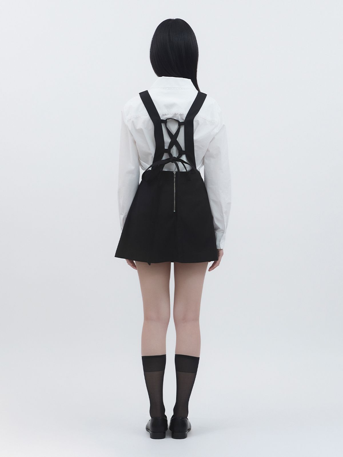 뚜오미오(TUOMIO) APRON-LIKE MINI DRESS [BLACK]