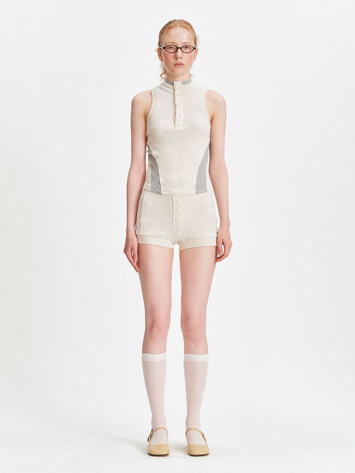 뚜오미오(TUOMIO) POLO SLEEVELESS [OATMEAL]