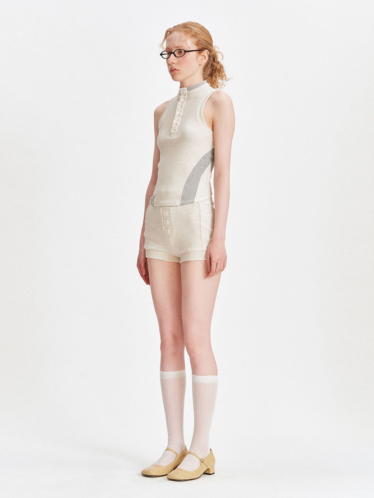 뚜오미오(TUOMIO) POLO SLEEVELESS [OATMEAL]