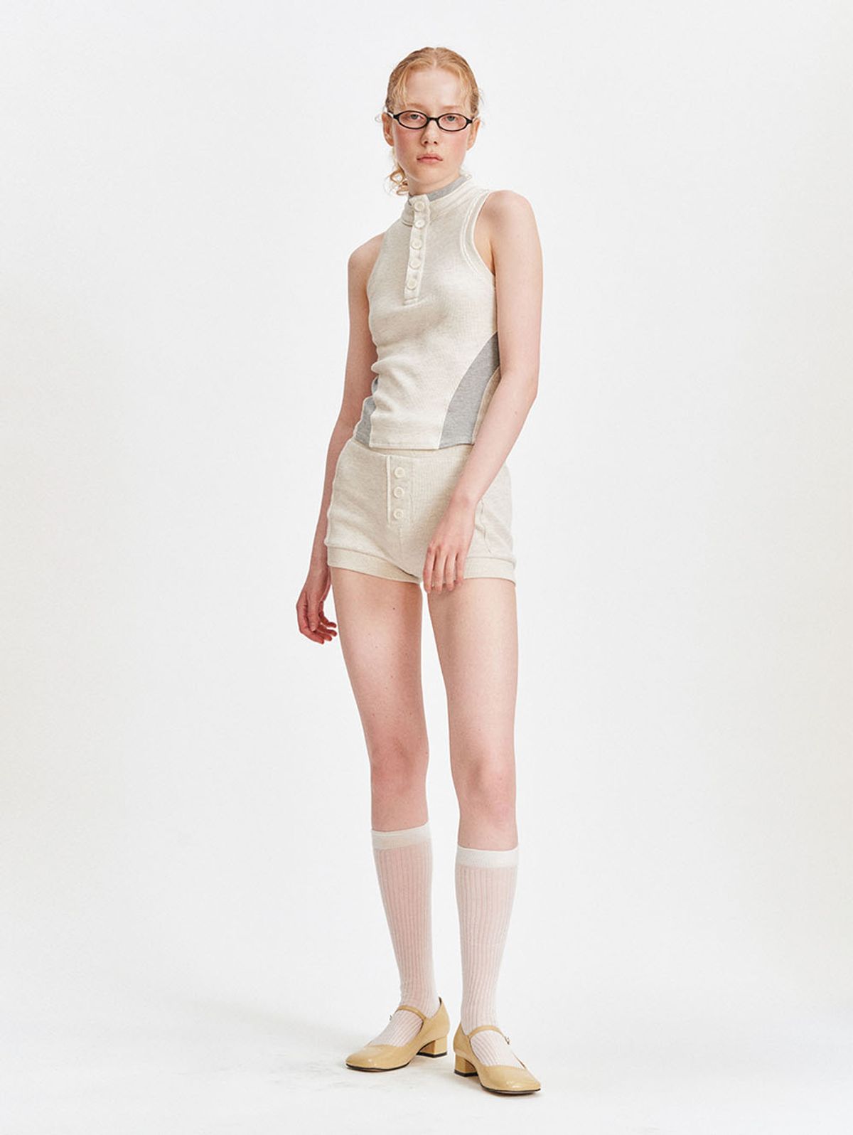뚜오미오(TUOMIO) POLO SLEEVELESS [OATMEAL]