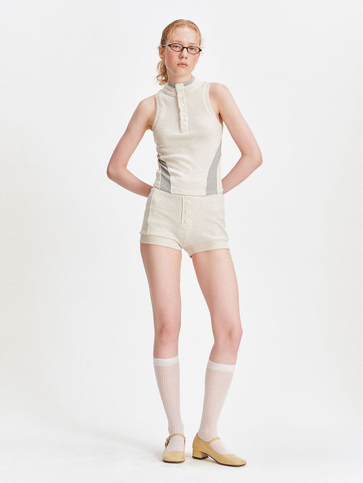 뚜오미오(TUOMIO) POLO SLEEVELESS [OATMEAL]