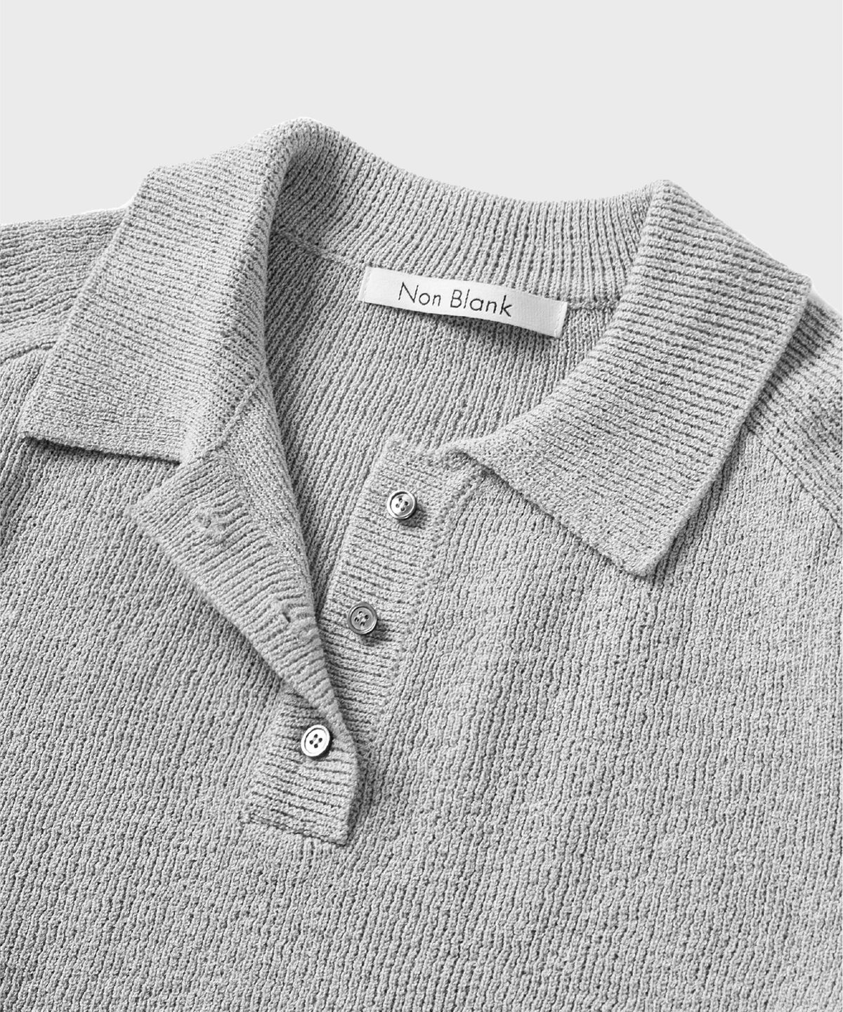 넌블랭크(NONBLANK) 래글런 하프 슬리브 칼라 크롭 니트_GREY