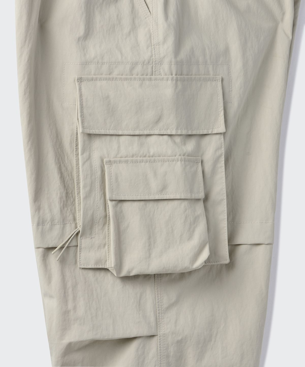 무신사 스탠다드(MUSINSA STANDARD) [시티 레저] 벨티드 멀티 포켓 카고 팬츠 [더스티 크림]