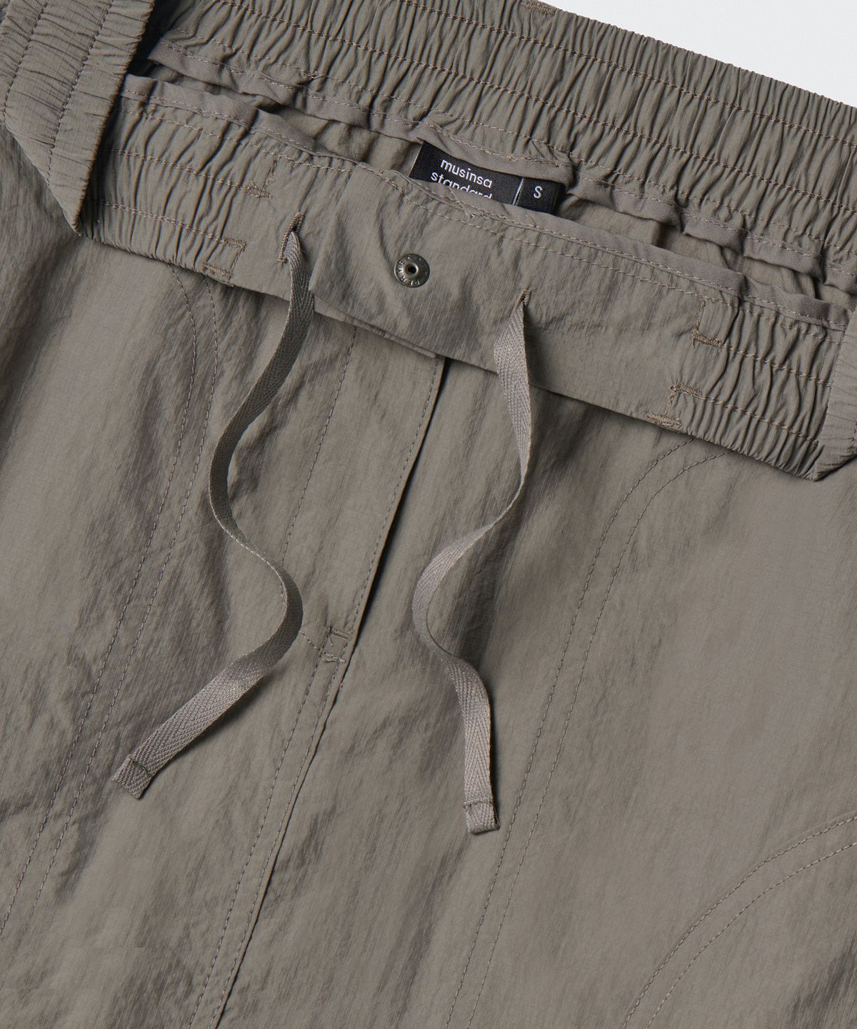 무신사 스탠다드 우먼(MUSINSA STANDARD WOMAN) 우먼즈 나일론 립스탑 유틸리티 밴딩 롱 스커트 [토프 베이지]