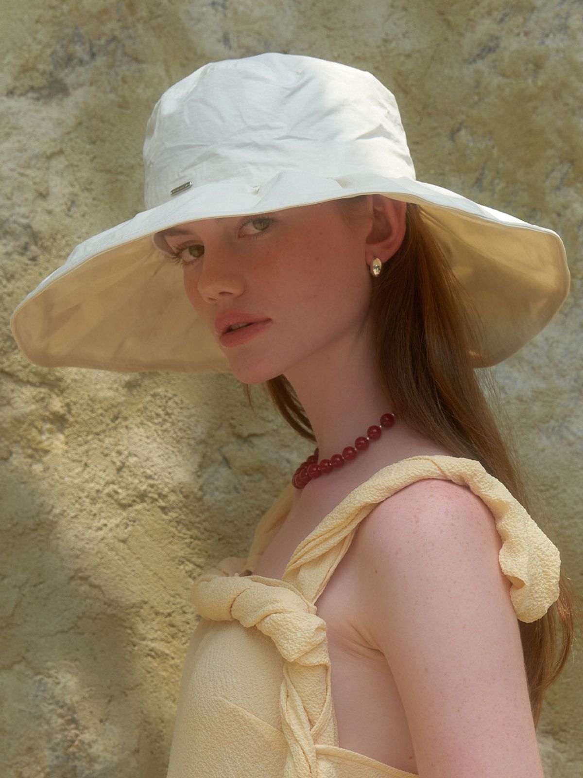 러브미몬스터(LOVE ME MONSTER) Sunflower Bucket Hat_Ivory (L242MCP050)
