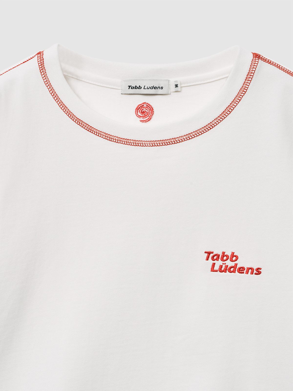 탭루덴스(TABBLUDENS) WM_Orange Stitch Tee_Off White