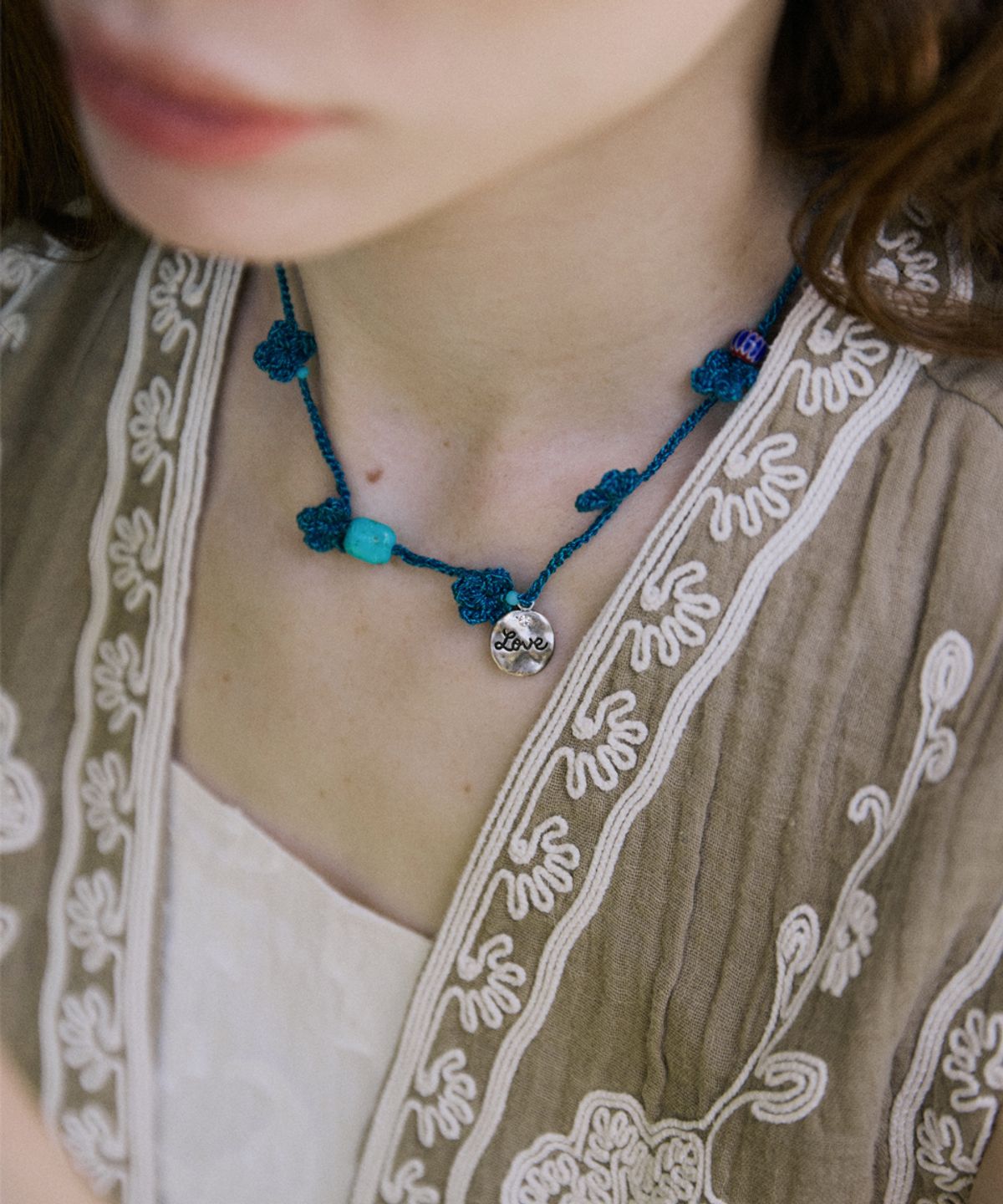 메리모티브(MERRYMOTIVE) Bluegreen clover crochet knit necklace