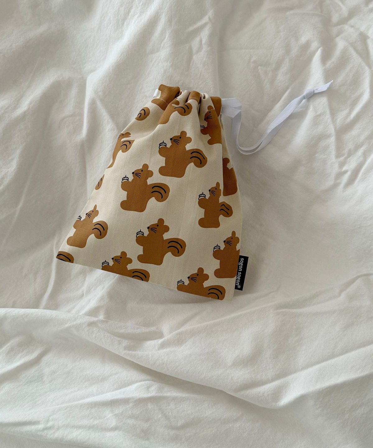 소곤소곤(SOGONSOGON) acorn string pouch m