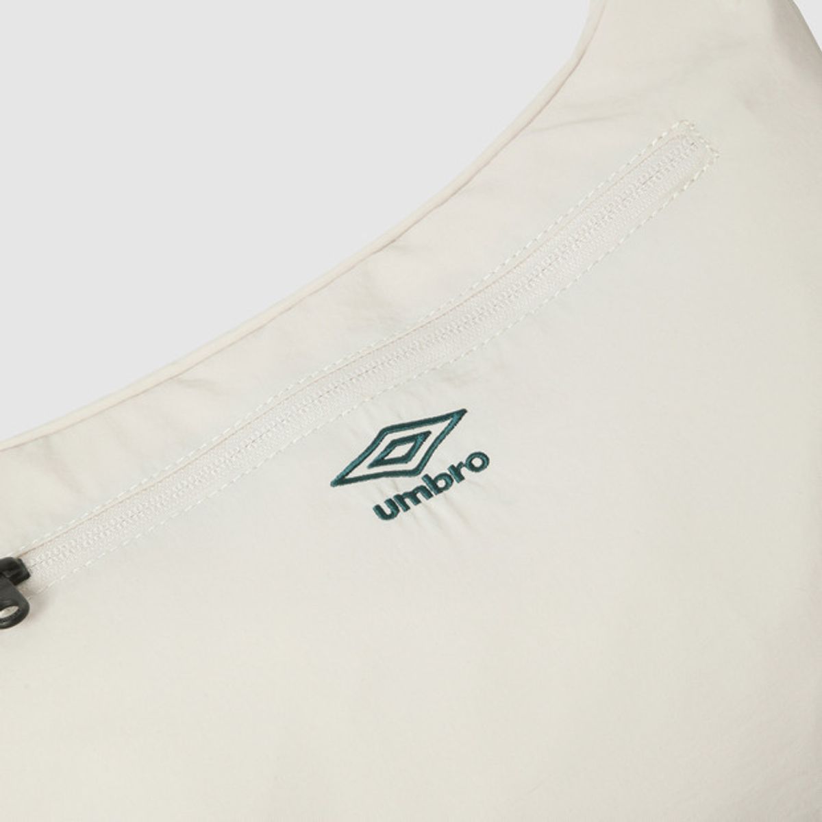 엄브로(UMBRO) 미니 포켓 호보백 베이지(UQ123CBG14)