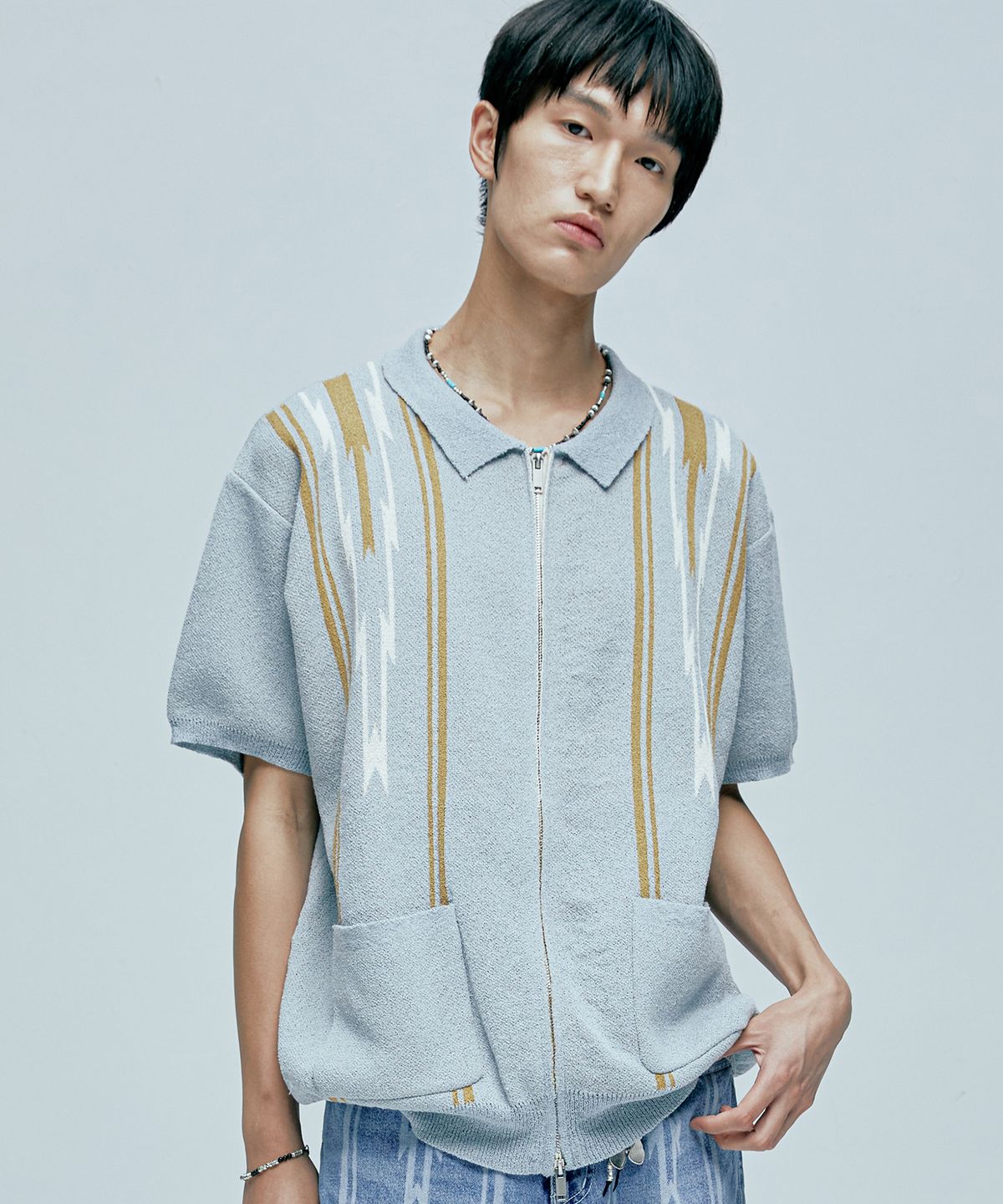 케이엔드(KND) 나바호 부클 니트 하프 가디건 커낼 블루